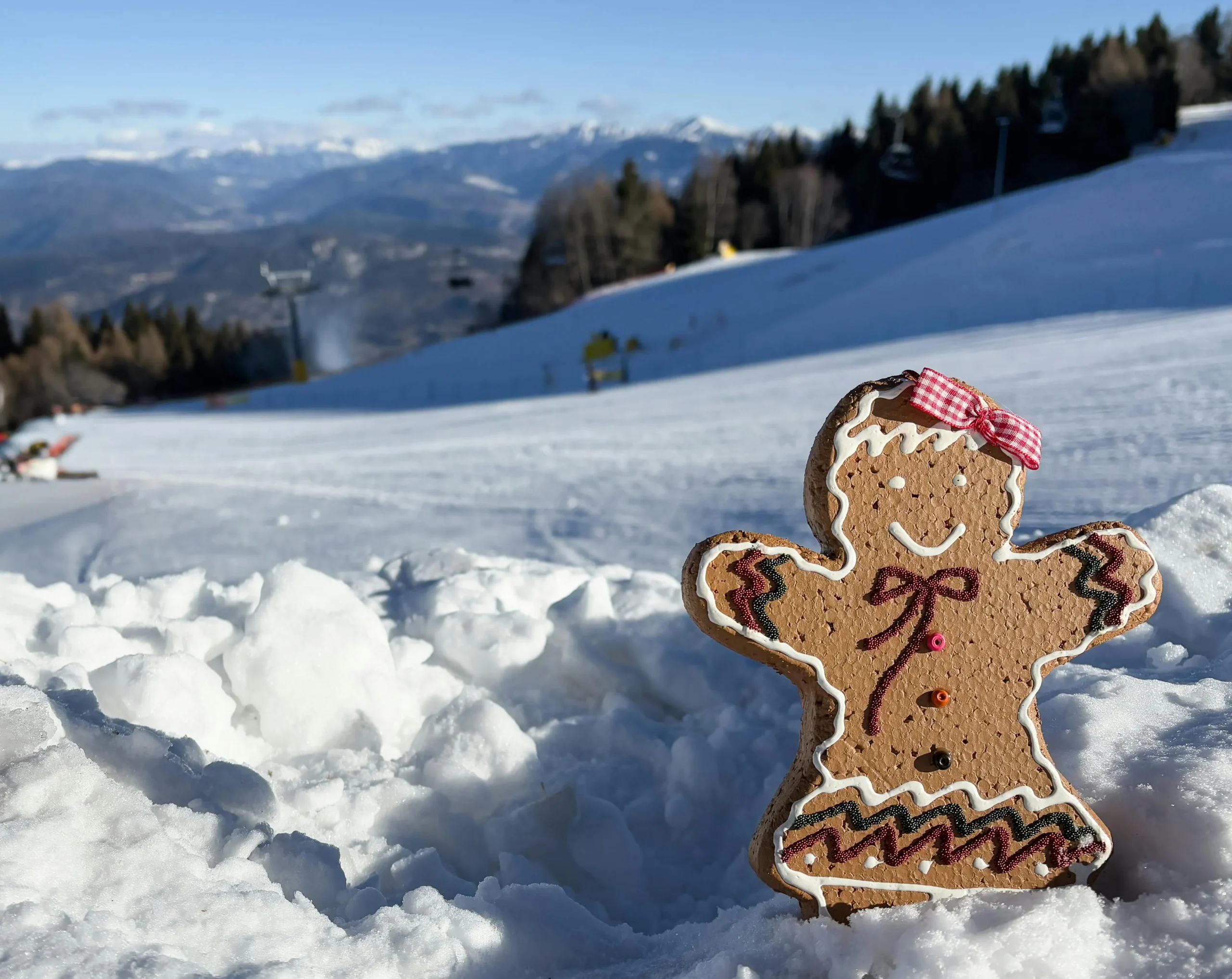 Best Winter Travel Destinations for December: Ski Resorts and Winter Wonderlands Snow-covered ski resort with Christmas lights and winter activities for December travel.